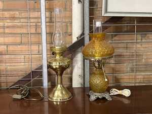 Two kerosene style electric table lamps