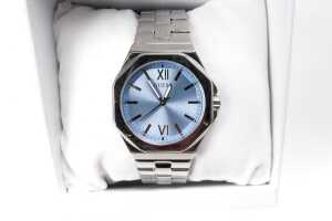 Five fashion watches and display case - 5