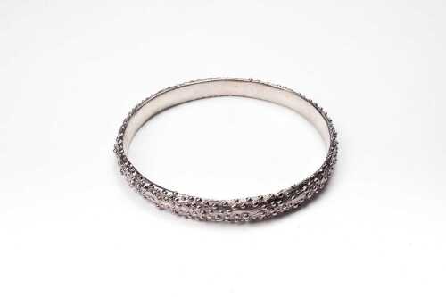 A Debra Fallowfield Kina sea urchin bangle in sterling silver