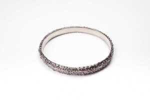 A Debra Fallowfield Kina sea urchin bangle in sterling silver