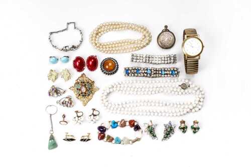 A collection of vintage jewellery and watches