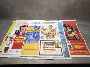 Nine vertical insert movie posters, including The Eiger Sanction
