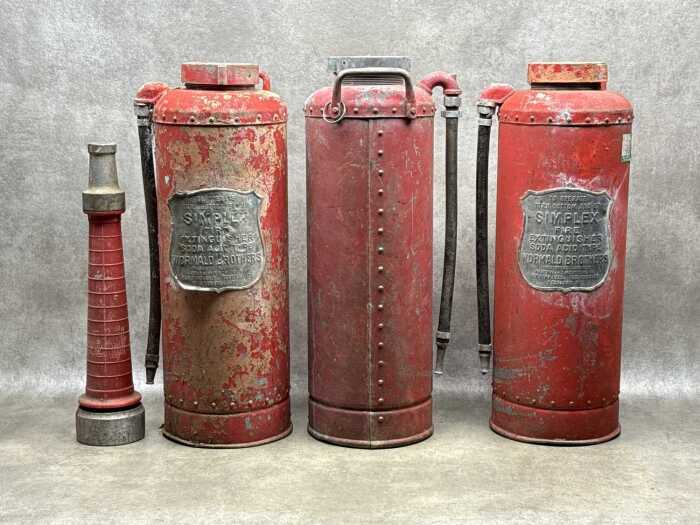 Three Simplex fire hydrants and a nozzle