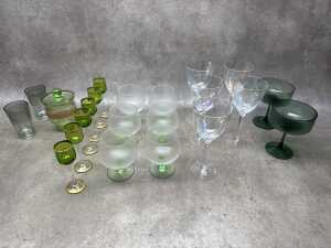 Mainly green-coloured glass stemware