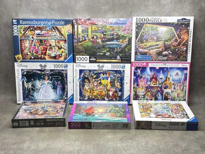 Nine jigsaw puzzles including Ravensburg, Disney, etc
