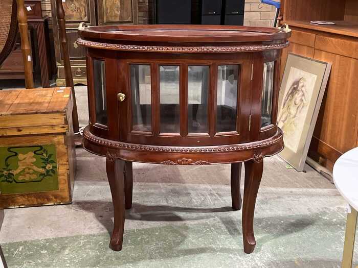Victorian style oval mahogany drinks cabinet