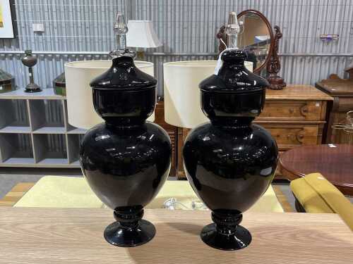 Pair of decorative amethyst glass apothecary jars with clear glass finials