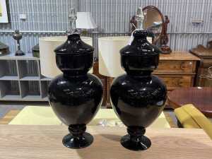 Pair of decorative amethyst glass apothecary jars with clear glass finials