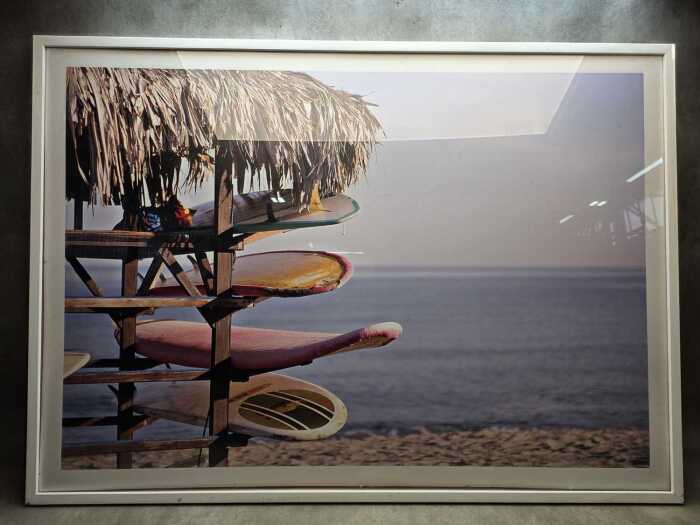 Contemporary photographic print of rack of surfboards