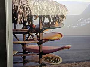 Contemporary photographic print of rack of surfboards - 2