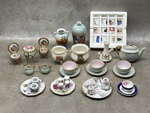 Miniature porcelain items including Limoges three piece table and chairs,