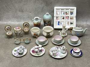 Miniature porcelain items including Limoges three piece table and chairs,
