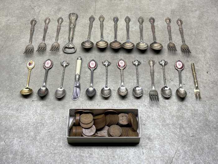 Australian pennies and assorted souvenir cutlery