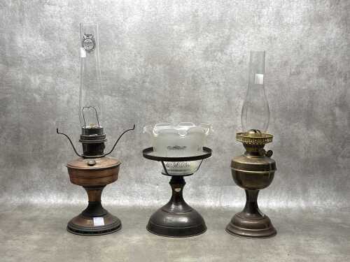 Three kerosene lamps