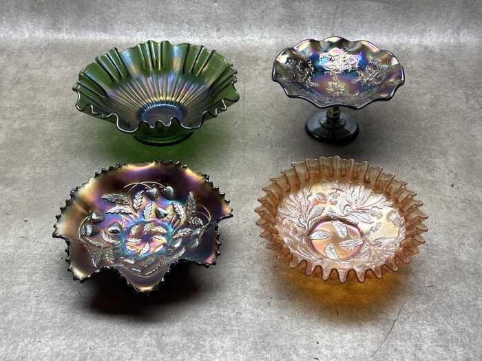 Four carnival glass bowls