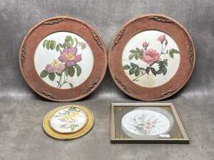 Four floral artworks, three in velvet frames