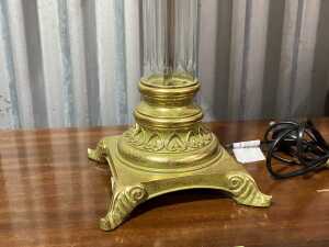 Neo-classical-style table lamp with clear column and gold-tone base. - 3