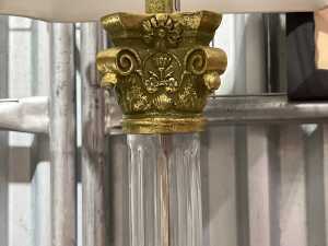 Neo-classical-style table lamp with clear column and gold-tone base. - 4