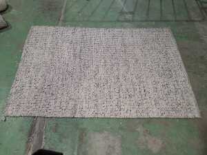 Machine-made wool and cotton floor rug