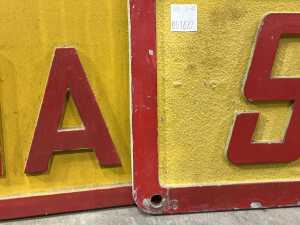 Two yellow and red painted cast metal signs - 4