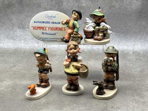 Five Goebel Hummel porcelain figures