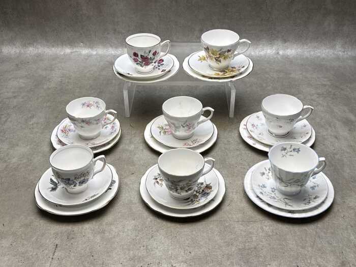 Eight Duchess English porcelain trios