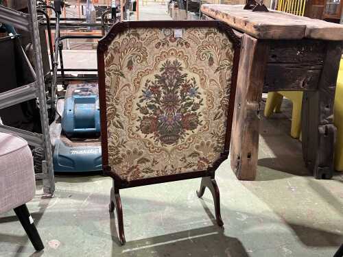Metamorphic tapestry fire screen table