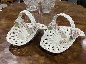 Two porcelain open-weave lattice baskets with rose design