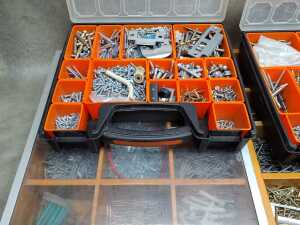 Four tool organisers filled with assorted screws, wall plugs, and bolts - 2