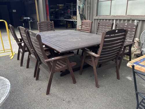 Nine-piece teak outdoor dining setting