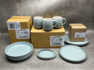 Group of Le Creuset dinnerware