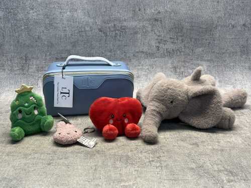 7 · The London Train Case Co. case & plush toys