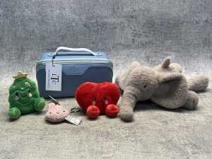 The London Train Case Co. case & plush toys
