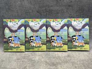 Four packs of Bluey collector coins