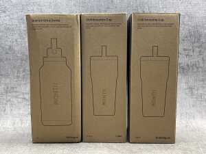 Three Montii carry cups