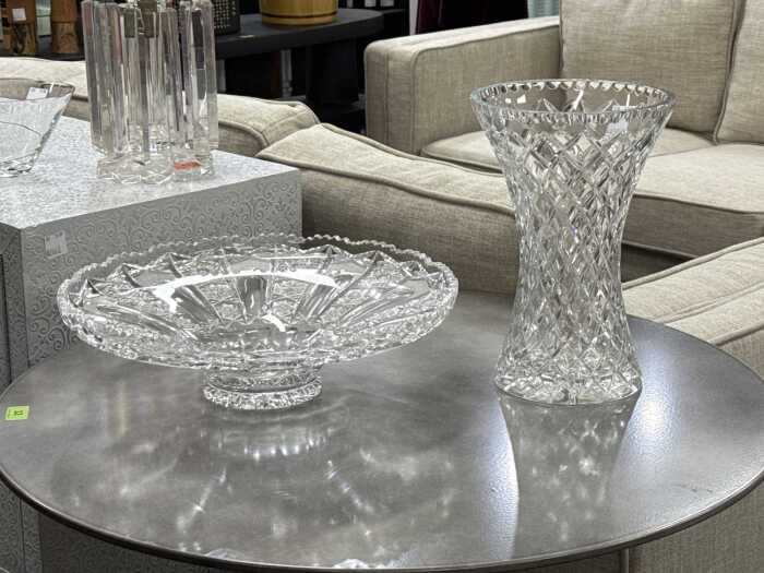 Two large cut crystal pieces including a centrepiece bowl and a vase.