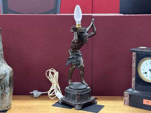 24 · Cast metal figural table lamp of Hercules after Paul Engel