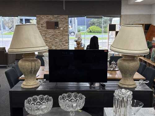 25 · Pair of large urn-form table lamps
