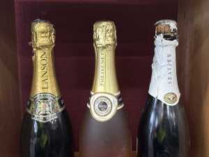 Three bottles of champagne - 5