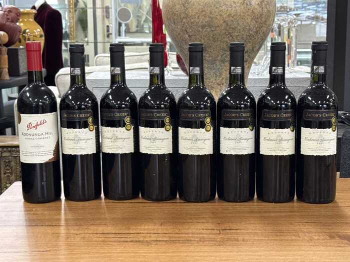 Eight bottles of red wine including Jacob's Creek and Penfolds