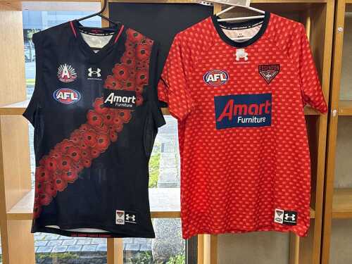 Two Jake Stringer game worn and signed guernseys