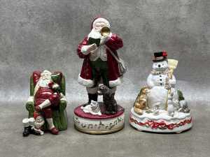 Three Christmas ceramic musical figures