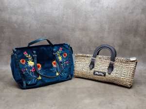 Two designer style handbags
