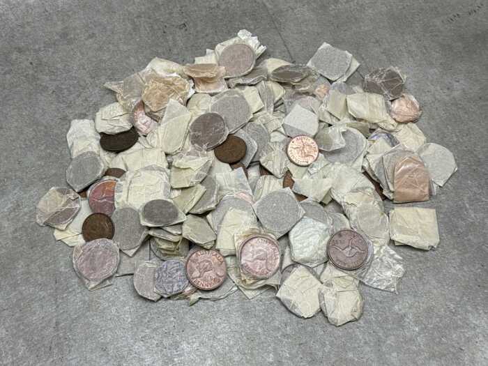 A tin of assorted Australian pennies and halfpennies
