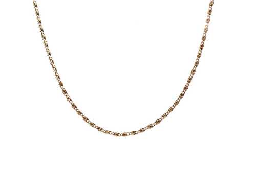 An Italian fancy link necklace in 9 carat yellow gold