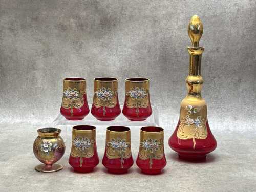 Venetian ruby glass seven piece drinks set, plus a vase