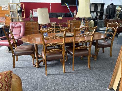 Seven-piece American oak oval extension dining suite