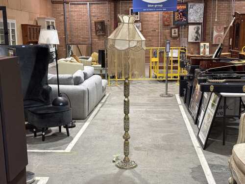 Brass standard lamp with fringed shade