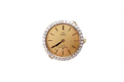 An Omega constellation diamond ladies watch in 18 carat yellow gold