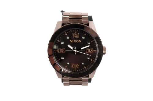 A Nixon Corporal dark roast quartz watch
